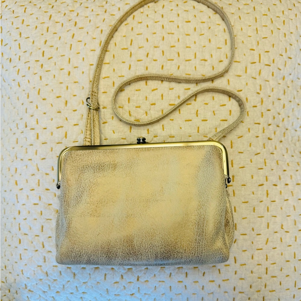 Lovely soft calfskin leather burnished gold over cream small purse. Like new.